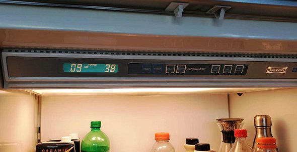 Sub-zero refrigerator with "service" sign on